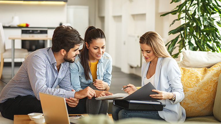Financial advisor providing recommendations to two clients